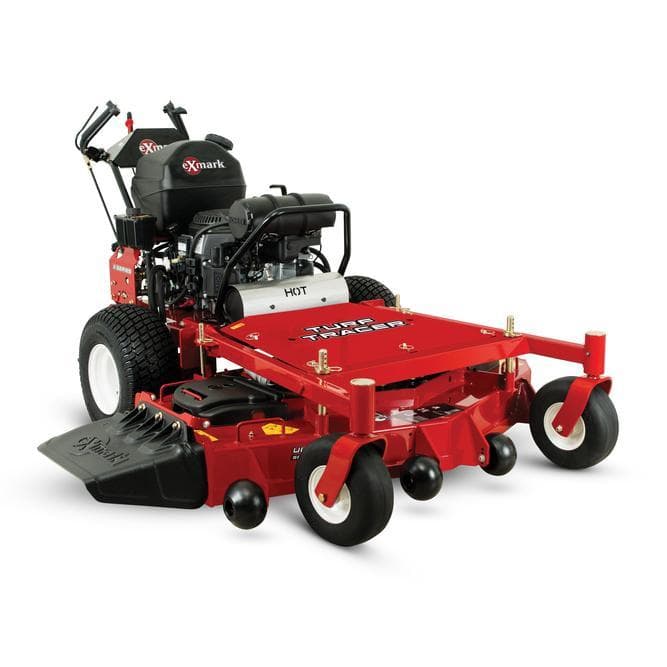 Master the slopes with the Exmark Turf Tracer Series. These heavy-duty commercial walk-behind mowers feature the Enhanced Control System (ECS) and UltraCut decks for a professional finish on any terrain.