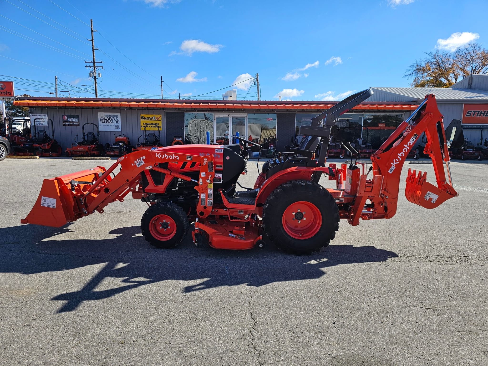 USED LX2620HSD WITH BACKHOE